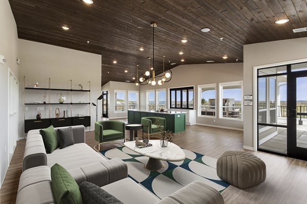 Chic clubhouse with modern furnishings at Arasan Apartments, offering luxury relaxation spaces for residents