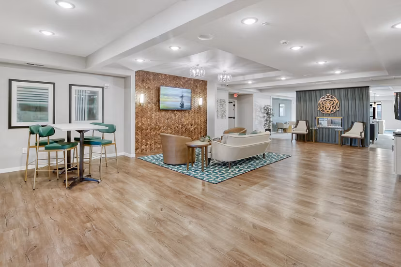Contemporary clubhouse featuring stylish lounge areas at Arasan Apartments