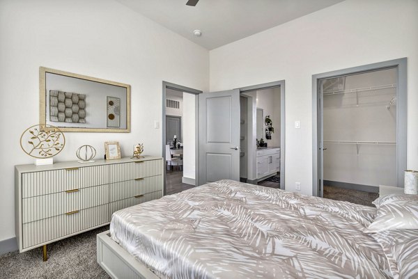 Cozy bedroom with stylish decor at Preserve at Highway 6 Apartments