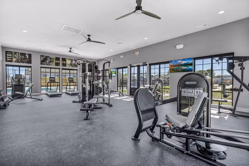 Modern fitness center with state-of-the-art equipment at Preserve at Highway 6 Apartments in Houston