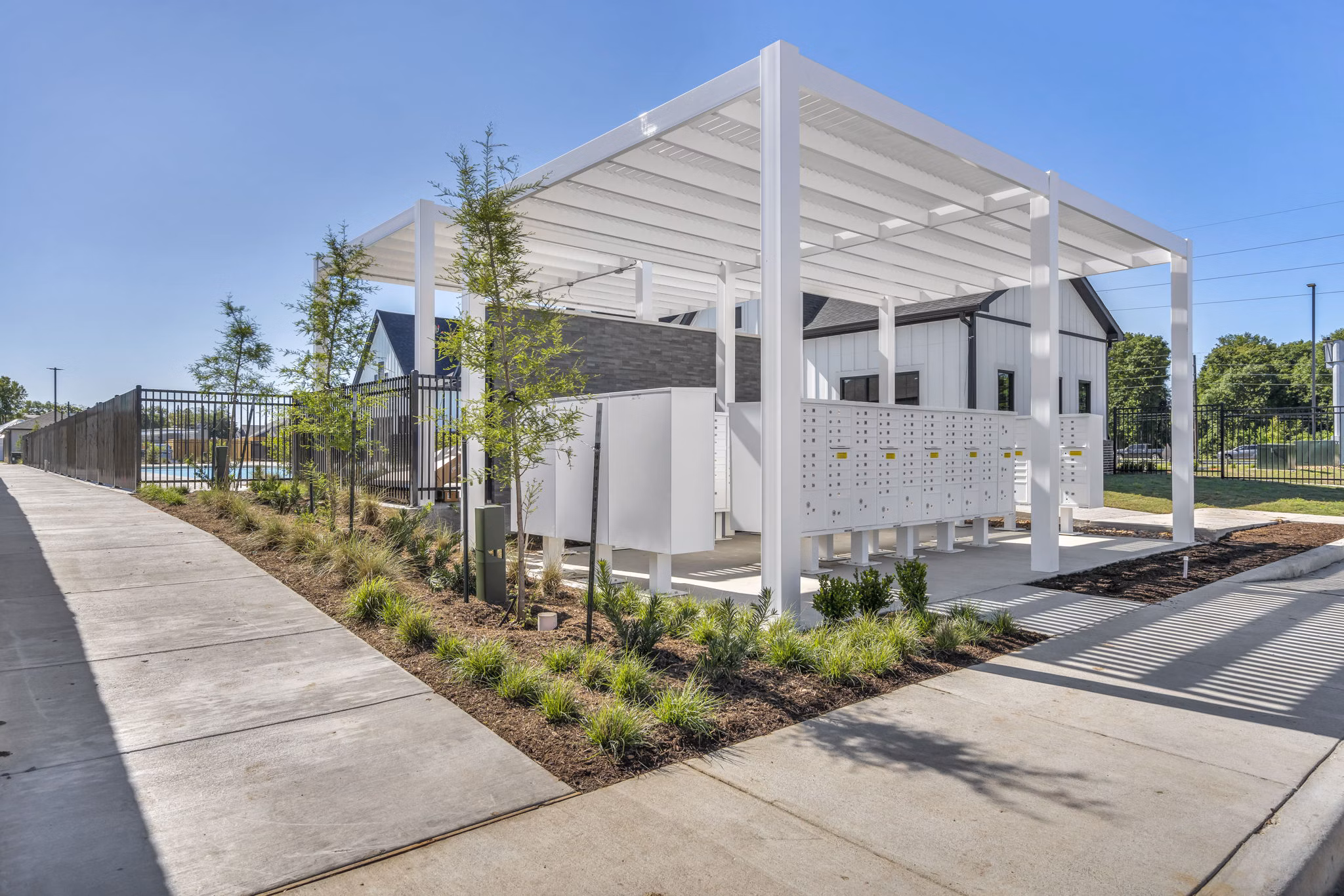 Courtyard with lush greenery at Preserve at Highway 6 Apartments, offering serene outdoor spaces for relaxation and leisure