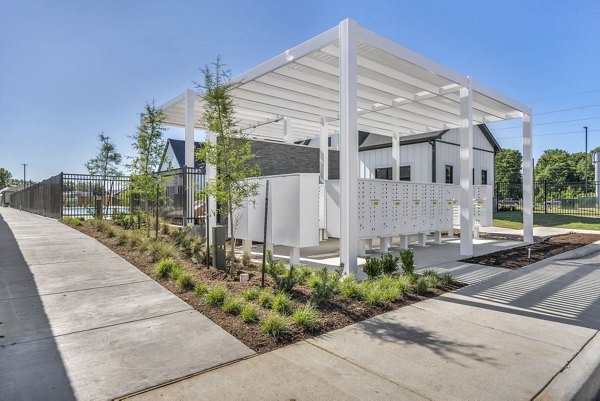 Courtyard with lush greenery at Preserve at Highway 6 Apartments, offering serene outdoor spaces for relaxation and leisure