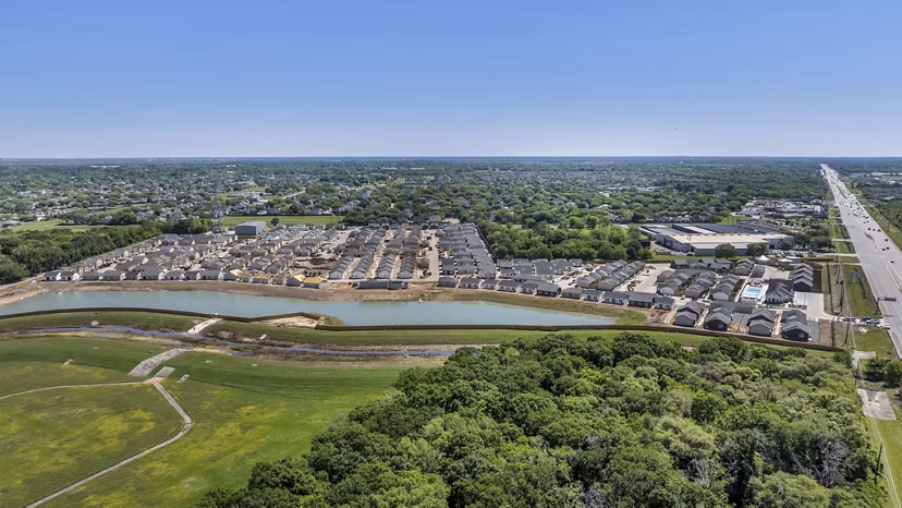 Preserve at Highway 6: Scenic view of luxury apartments exterior, featuring lush landscaping and modern architecture