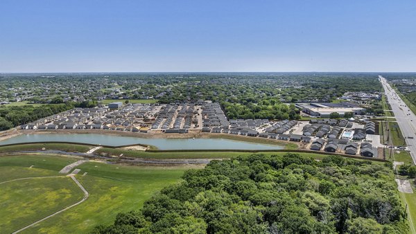 Preserve at Highway 6: Scenic view of luxury apartments exterior, featuring lush landscaping and modern architecture