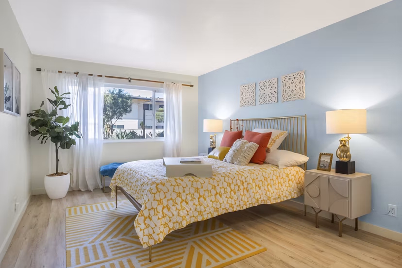 Cozy bedroom with modern decor at Fremont City Center Apartments