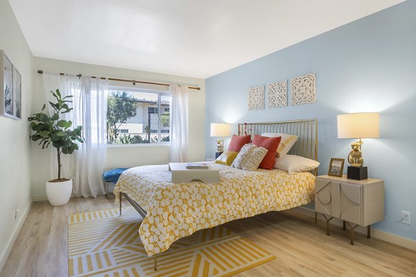 Cozy bedroom with modern decor at Fremont City Center Apartments