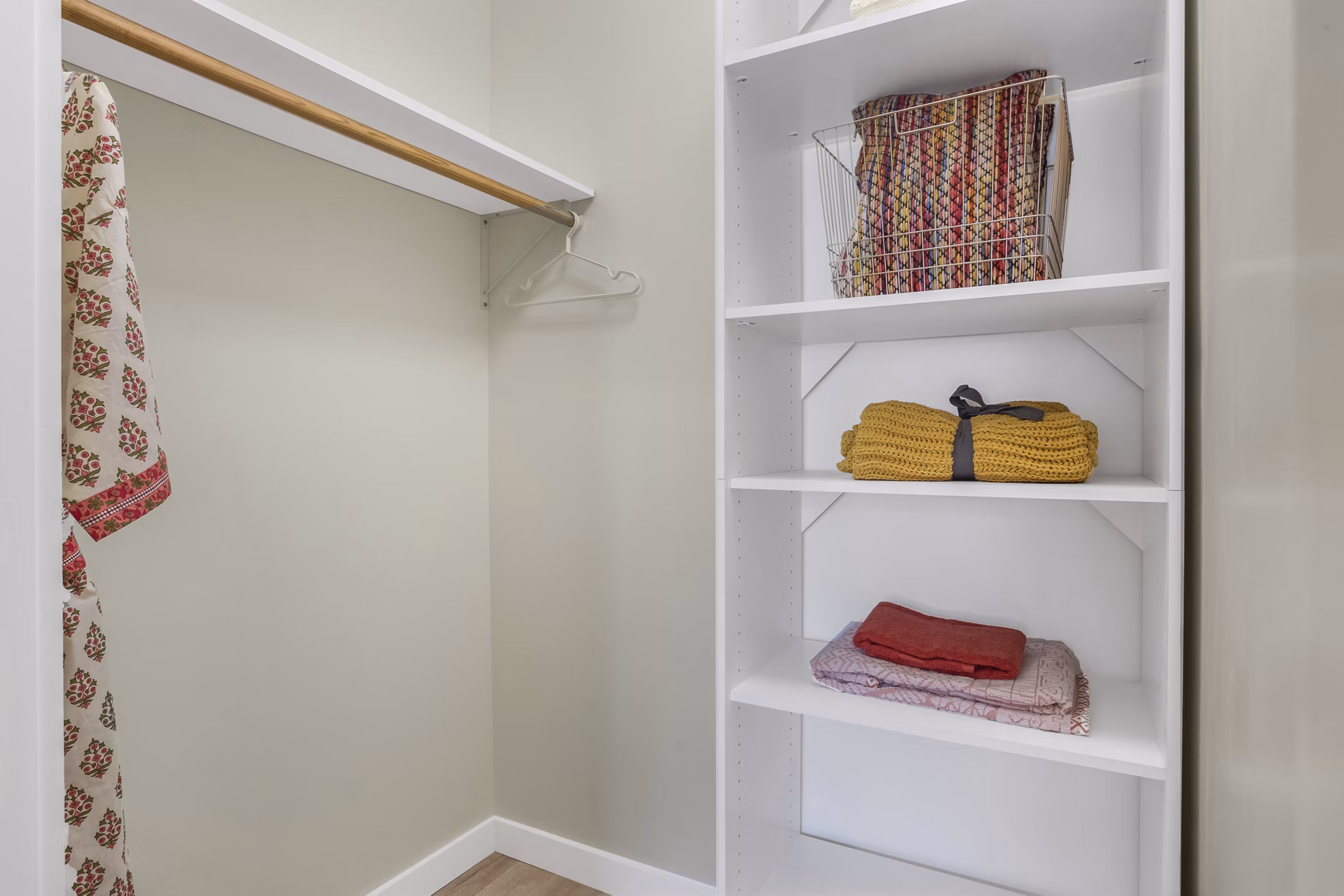 Spacious closet with built-in organizers at Fremont City Center Apartments