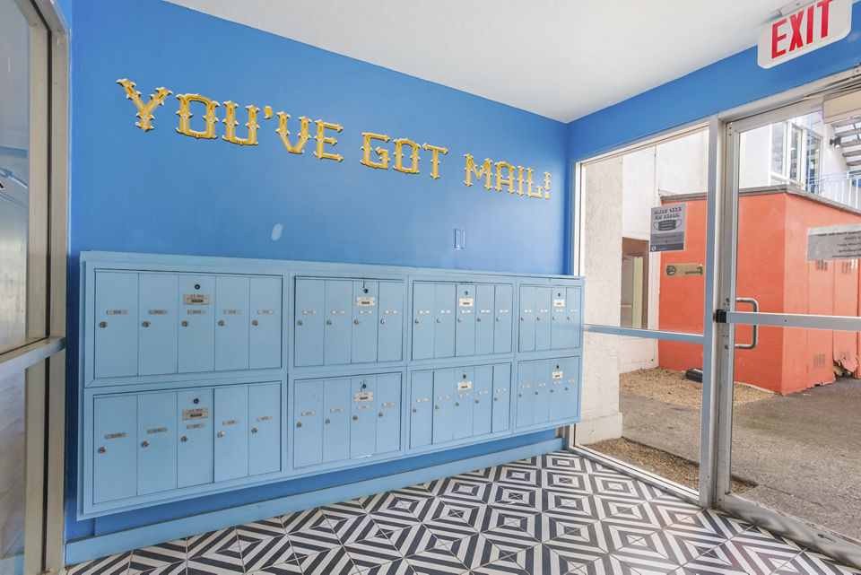 Efficient mail room with package lockers at Fremont City Center Apartments, ensuring secure delivery for residents