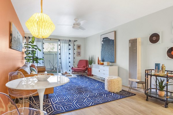 Dining area with modern decor and ample seating in Fremont City Center Apartments