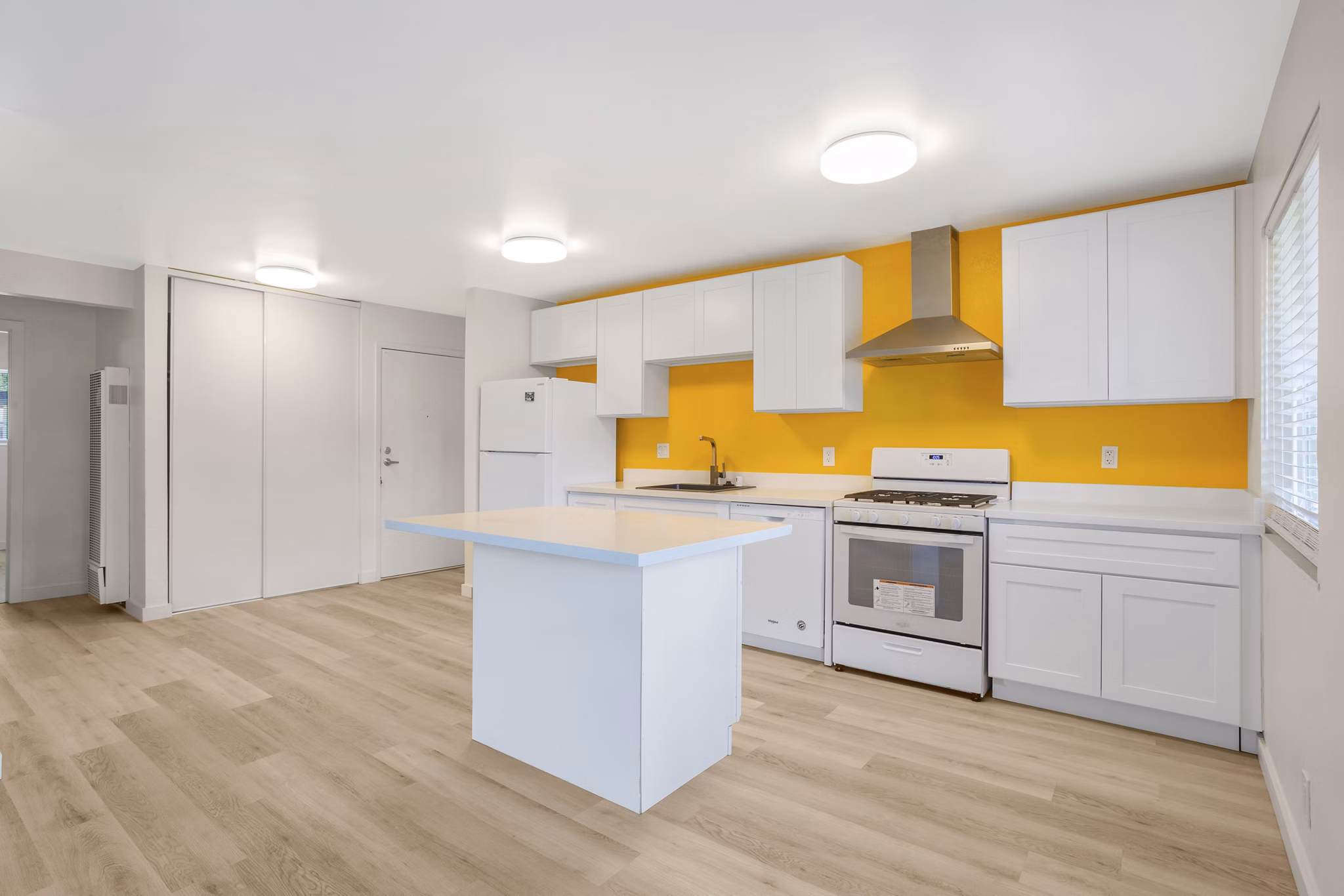 Modern kitchen with stainless steel appliances in Fremont City Center Apartments
