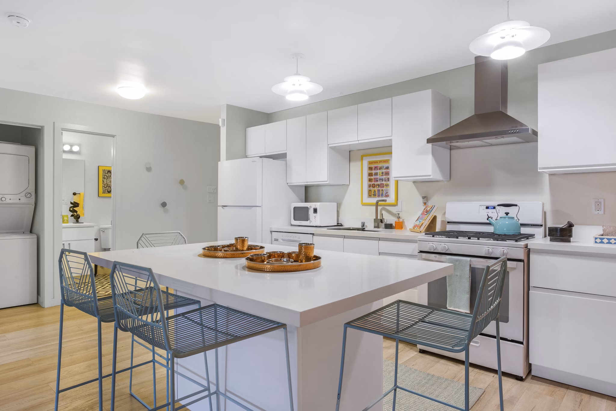 Modern kitchen with sleek countertops and stainless steel appliances at Fremont City Center Apartments, available for rent now