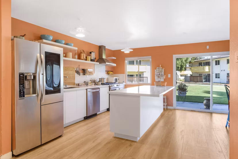 Modern kitchen featuring sleek countertops and stainless steel appliances at Fremont City Center Apartments