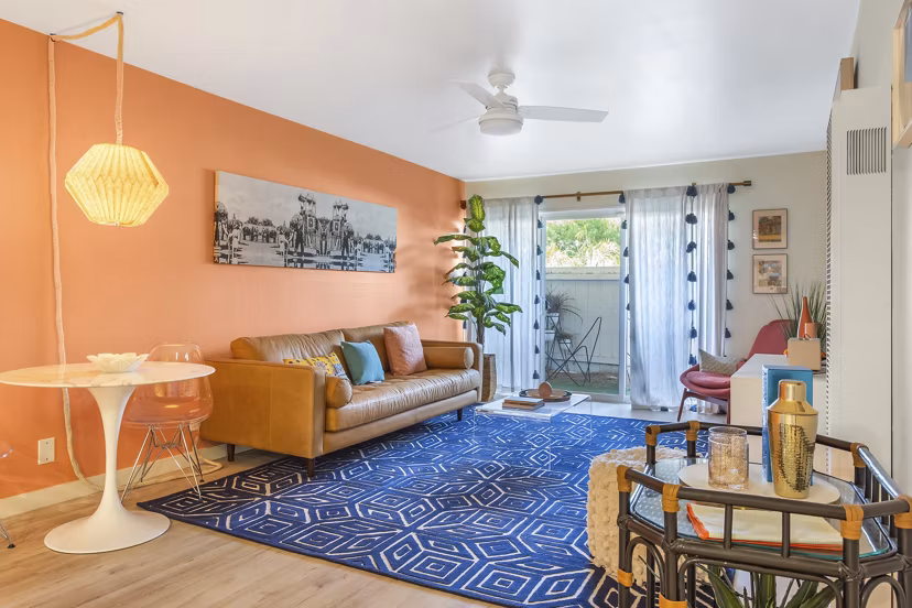 Cozy living room with modern furnishings at Fremont City Center Apartments