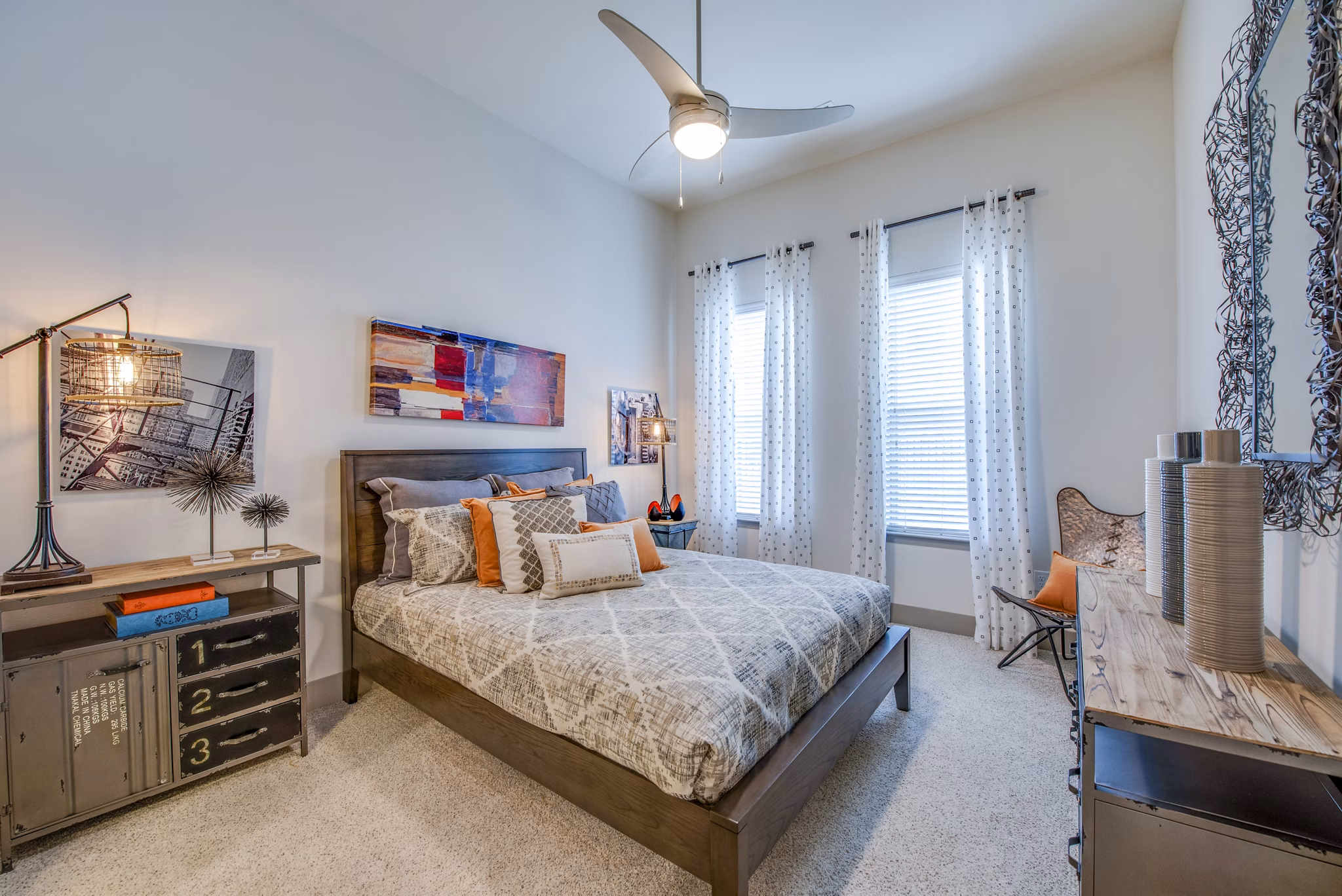 Elegant bedroom with plush bedding and modern decor at Bellrock Upper North Apartments