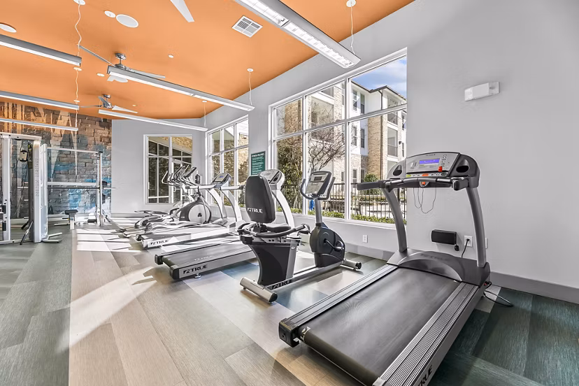 State-of-the-art fitness center with modern equipment at Bellrock Upper North Apartments