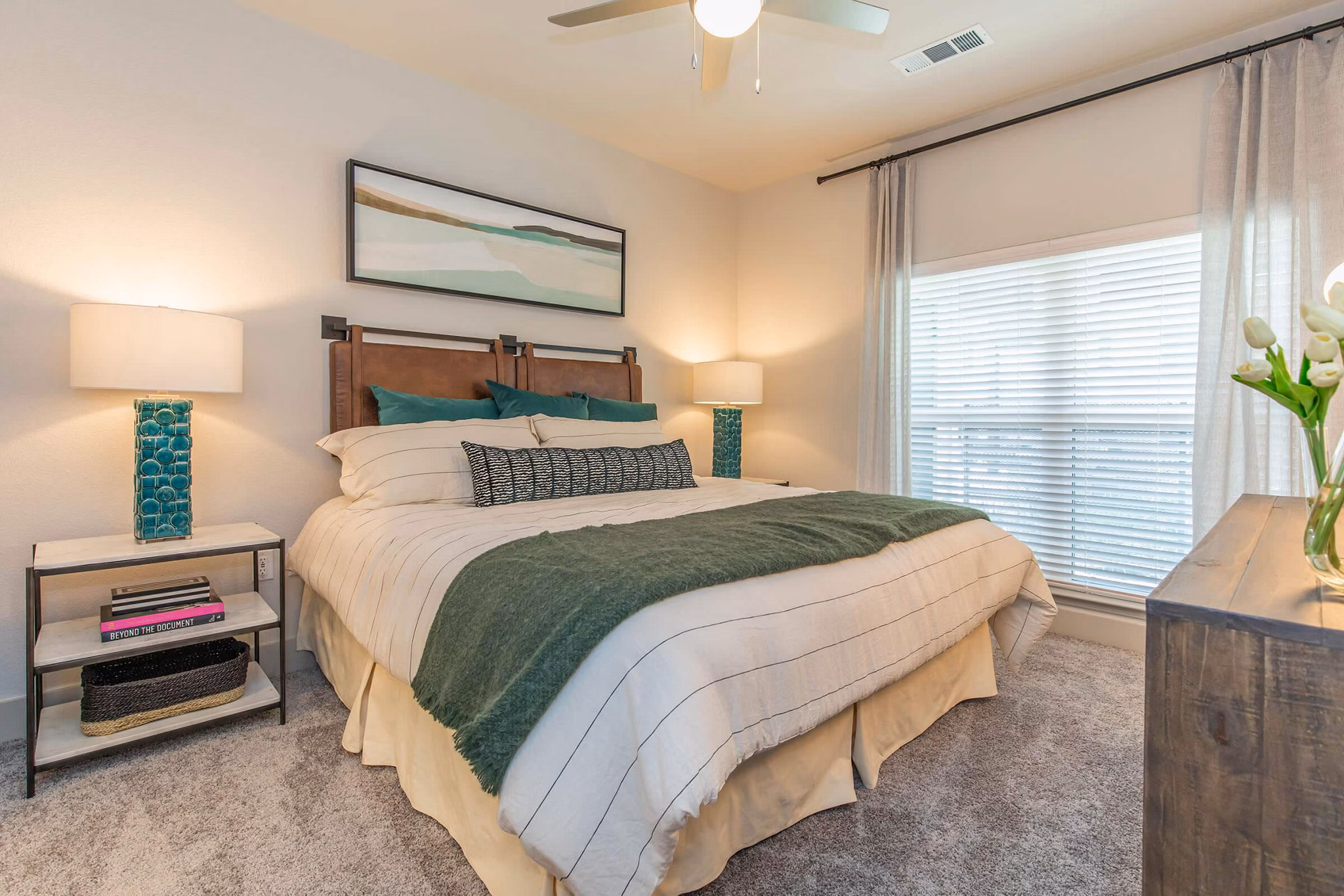Spacious bedroom with modern decor in Vibe Med Center Apartments, showcasing luxury living near Houston's Medical Center
