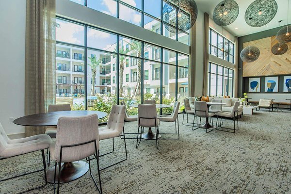 Modern clubhouse featuring elegant decor at Vibe Med Center Apartments in Houston, perfect for luxury living and social gatherings