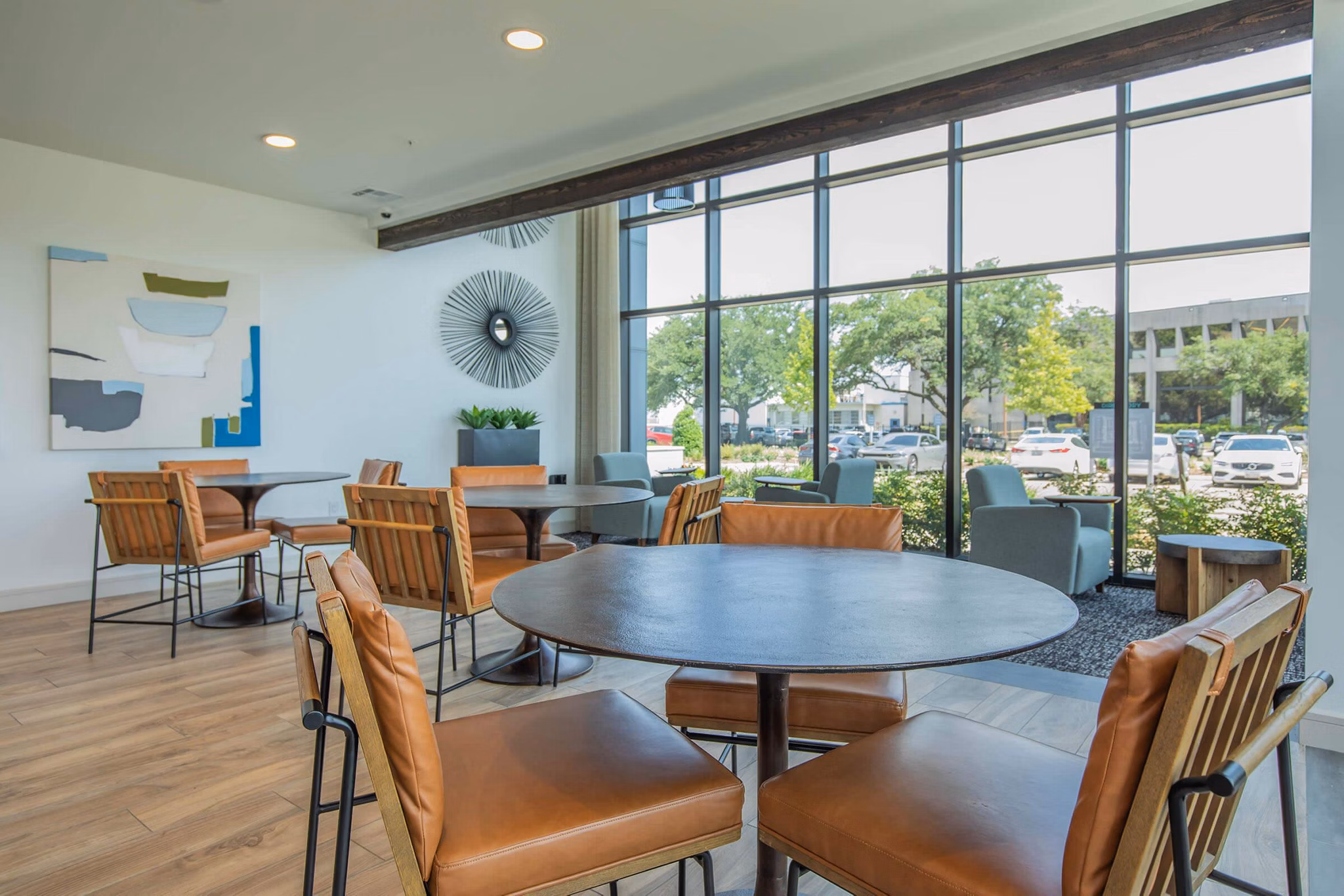 Contemporary clubhouse at Vibe Med Center Apartments with modern seating and entertainment areas in Houston