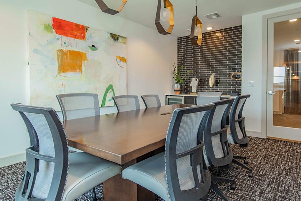 Meeting facility with modern furnishings at Vibe Med Center Apartments, perfect for hosting events and conferences in a luxurious setting