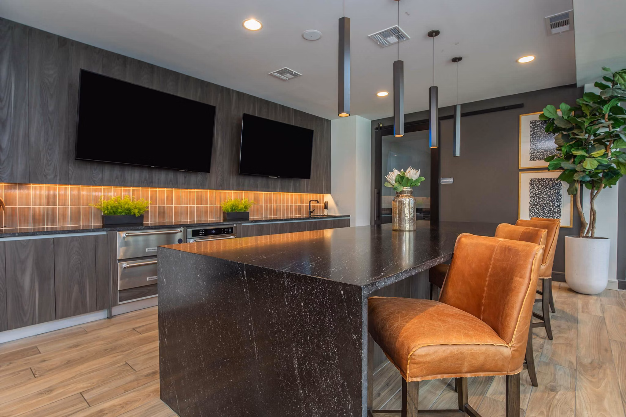 Contemporary clubhouse featuring modern seating and entertainment options at Vibe Med Center Apartments