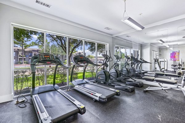 fitness center at Flats on Tanglewilde Apartments