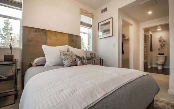 Cozy bedroom with stylish decor at MODA at Monrovia Station Apartments