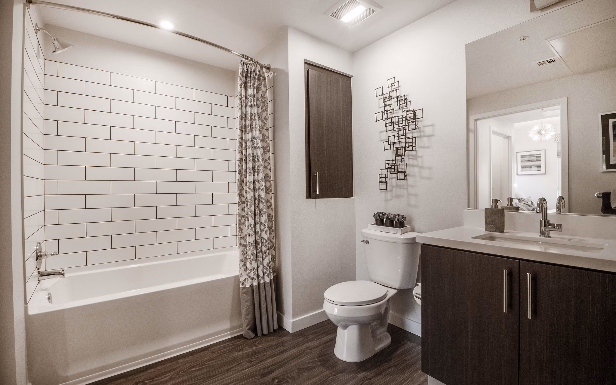 Bathroom with modern fixtures and elegant finishes at MODA at Monrovia Station Apartments