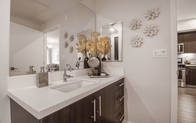Modern bathroom with elegant fixtures in MODA at Monrovia Station Apartments