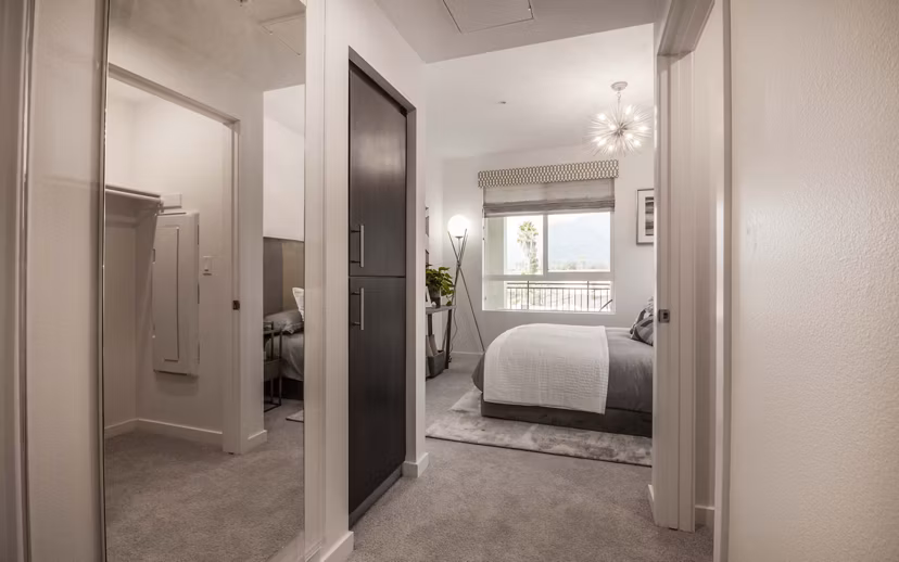 Modern hallway featuring stylish lighting and contemporary design in MODA at Monrovia Station Apartments