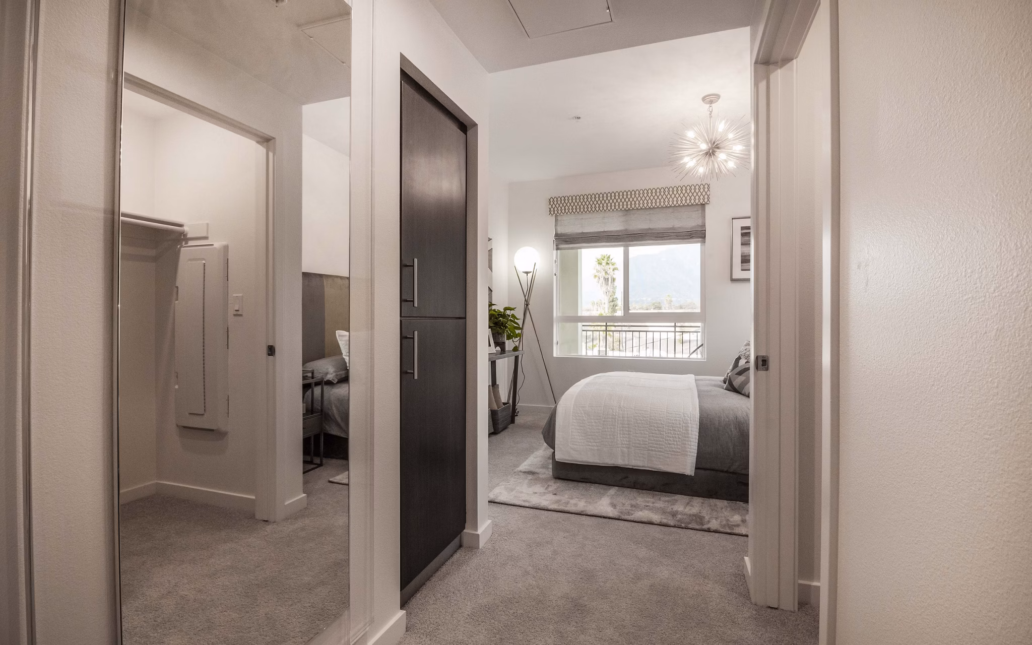 Modern hallway featuring stylish lighting and contemporary design in MODA at Monrovia Station Apartments