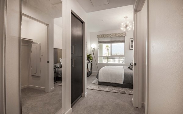 Modern hallway featuring stylish lighting and contemporary design in MODA at Monrovia Station Apartments