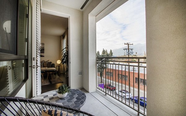 Contemporary patio space with stylish outdoor seating at MODA at Monrovia Station Apartments