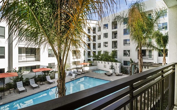 Spacious patio with garden views at MODA at Monrovia Station Apartments