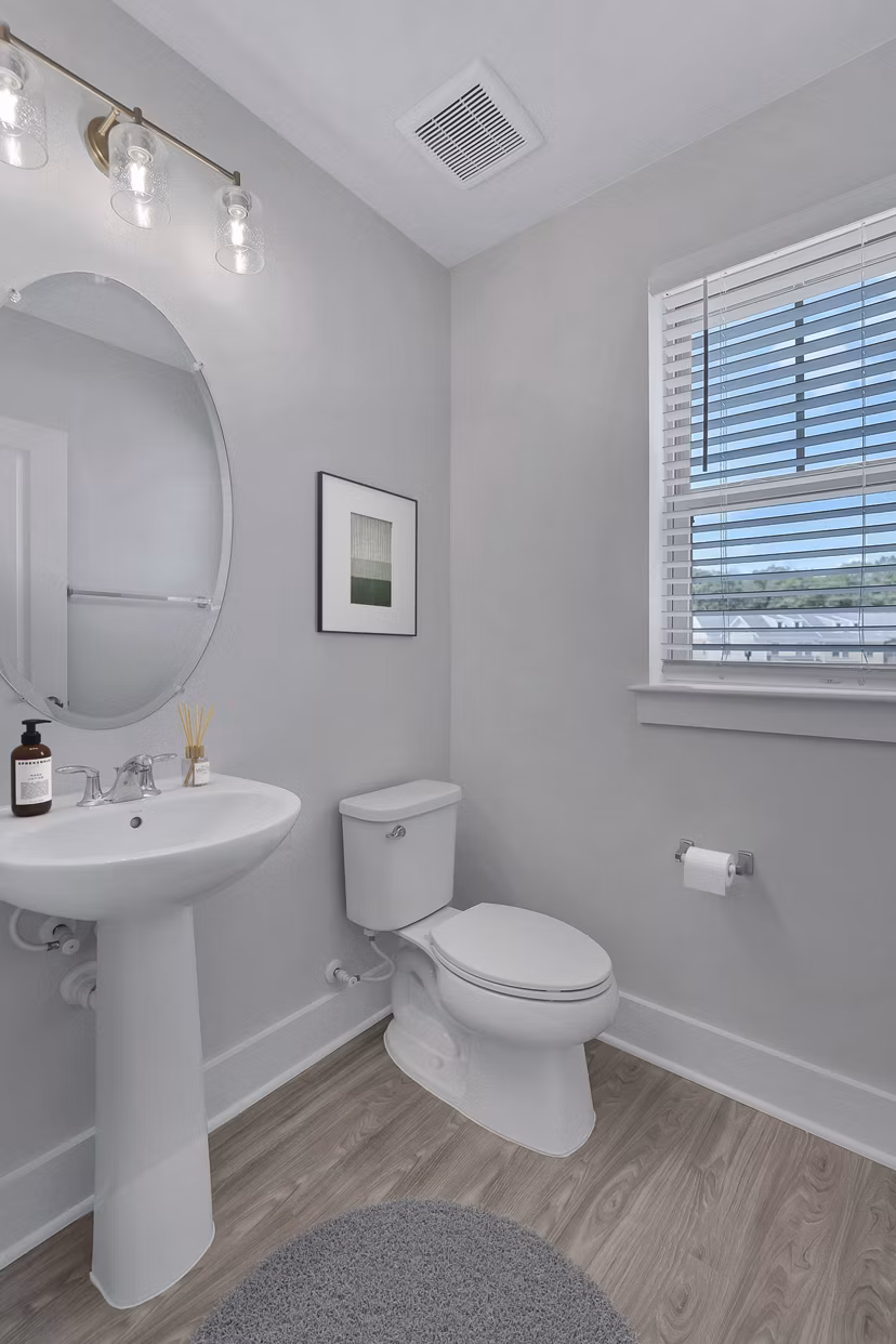 Modern bathroom featuring sleek fixtures and stylish design at Brookestone Townhomes luxury apartments