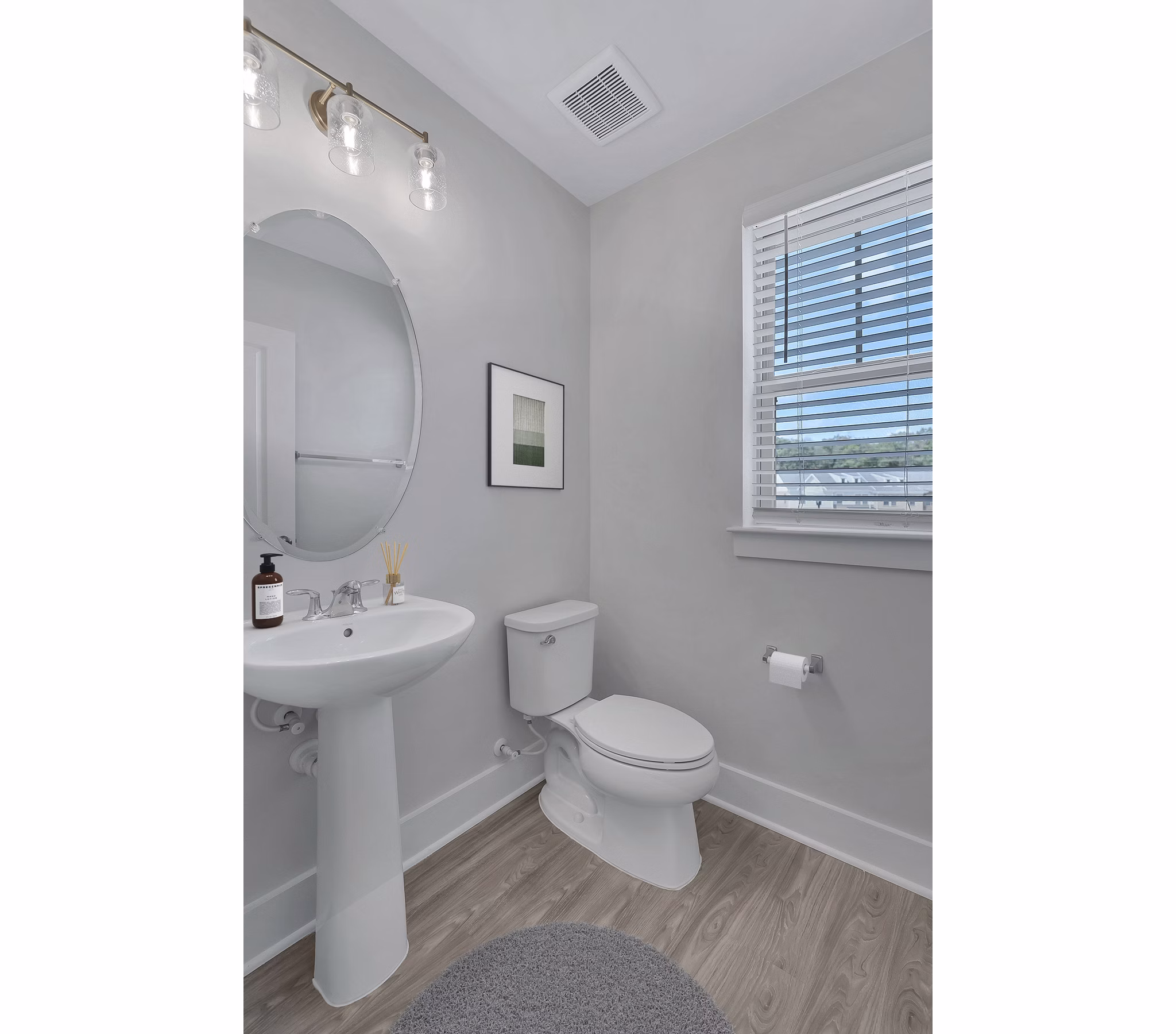 Modern bathroom featuring sleek fixtures and stylish design at Brookestone Townhomes luxury apartments
