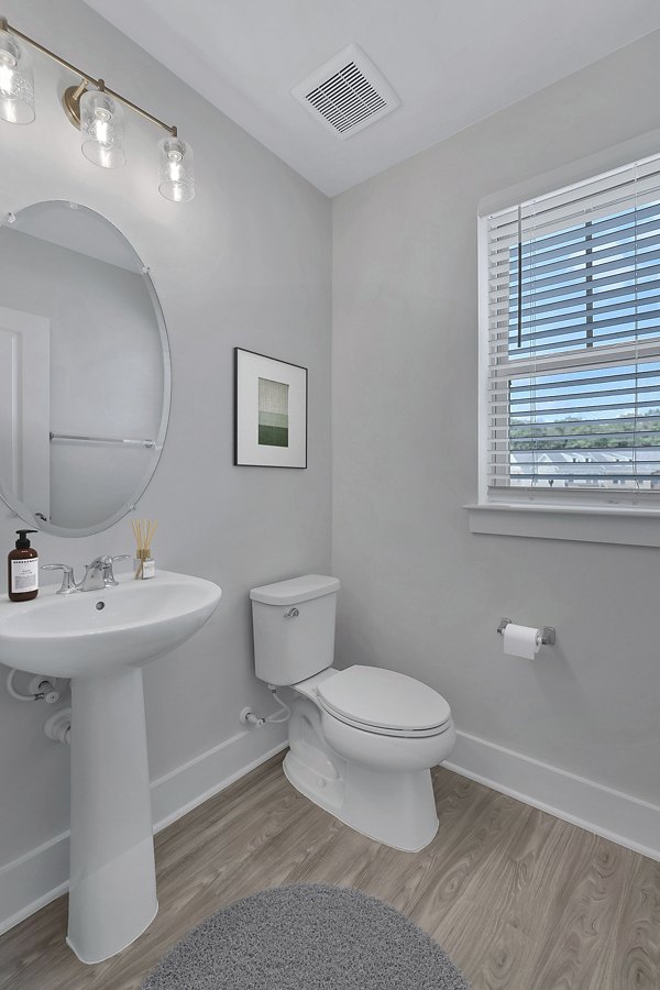 Modern bathroom featuring sleek fixtures and stylish design at Brookestone Townhomes luxury apartments