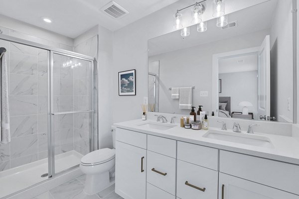 Bathroom featuring modern fixtures in Brookestone Townhomes apartments