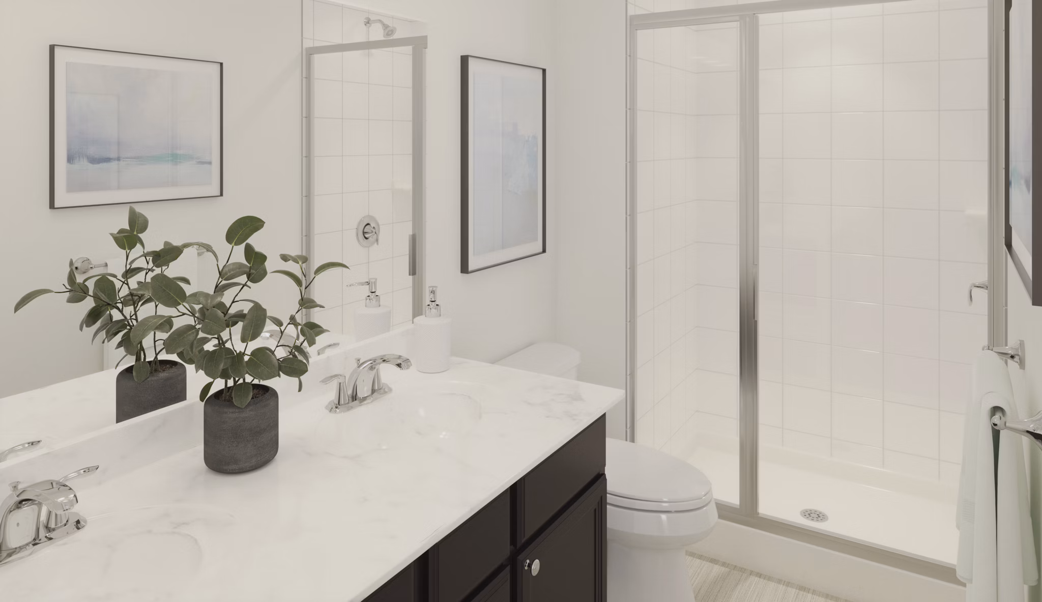 Modern bathroom with marble countertops in Brookestone Townhomes