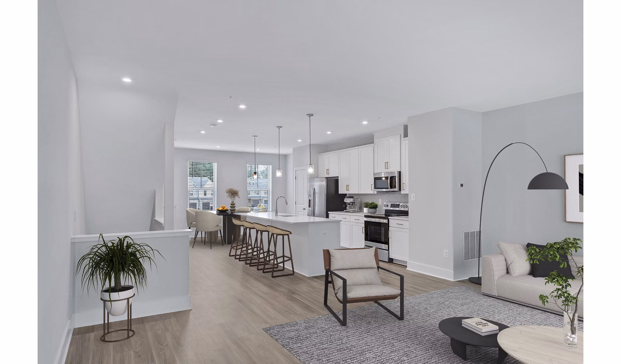 Kitchen with granite countertops and stainless steel appliances in Brookestone Townhomes luxury apartments