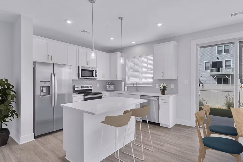 Modern kitchen with stainless steel appliances at Brookestone Townhomes
