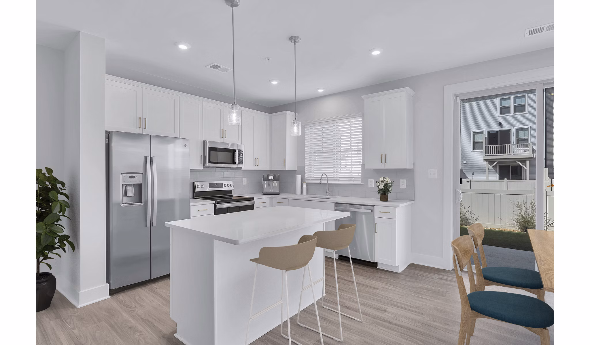 Modern kitchen with stainless steel appliances at Brookestone Townhomes