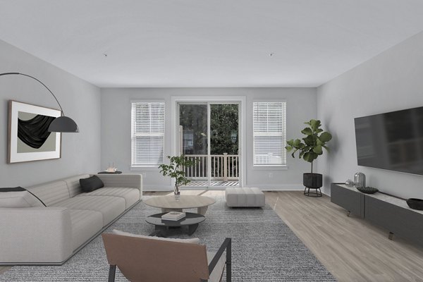 Spacious living room with modern decor in Brookestone Townhomes