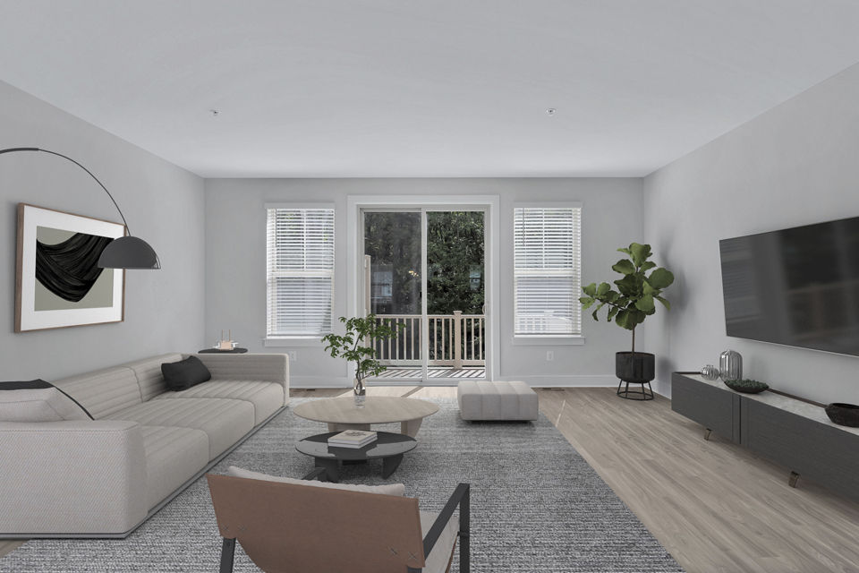 Spacious living room with modern decor in Brookestone Townhomes