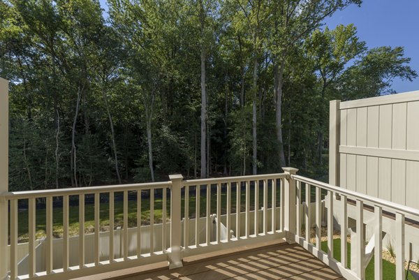 Cozy patio with outdoor seating at Brookestone Townhomes