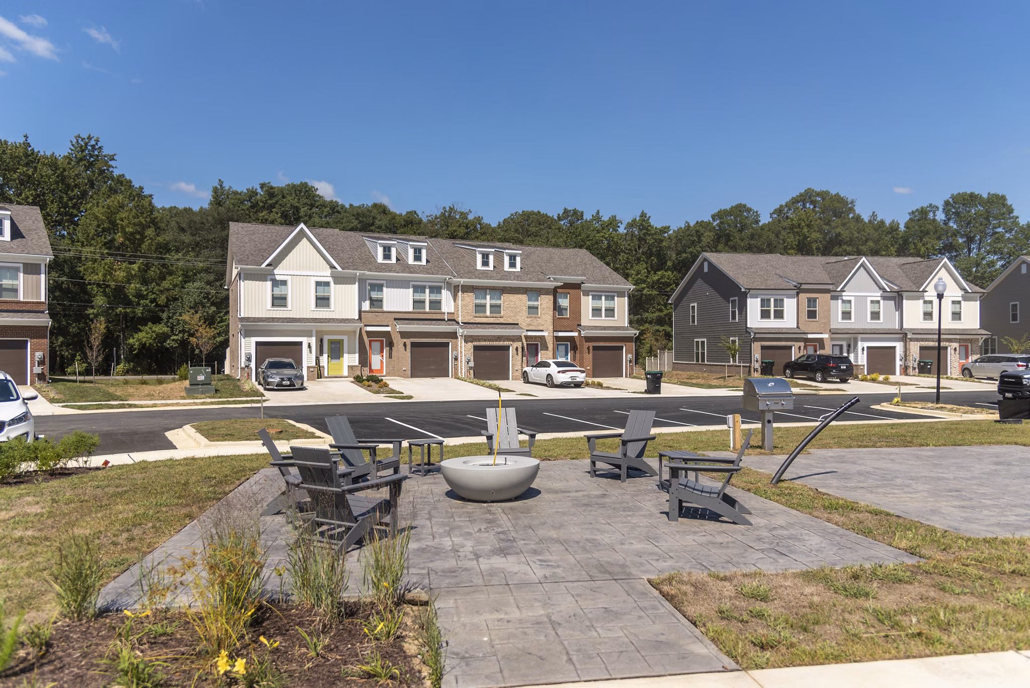 Cozy outdoor seating with a fire pit at Brookestone Townhomes