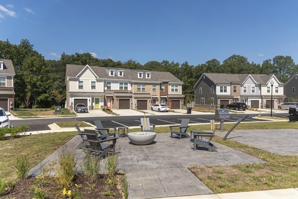 Cozy outdoor seating with a fire pit at Brookestone Townhomes