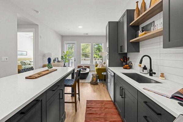 Kitchen showcasing modern appliances and spacious countertops in NOVEL Morrisville Apartments