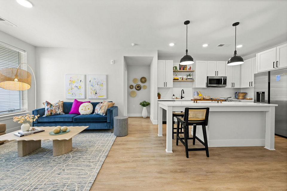 Cozy living room with modern decor in NOVEL Morrisville Apartments