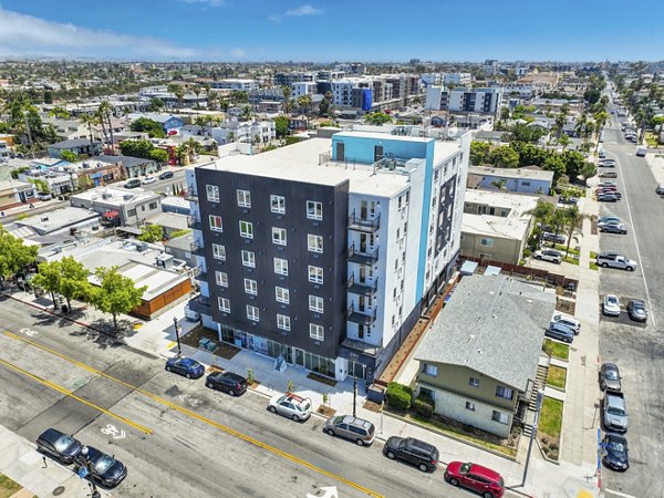 2911 Adams Apartments: Modern luxury apartment building exterior