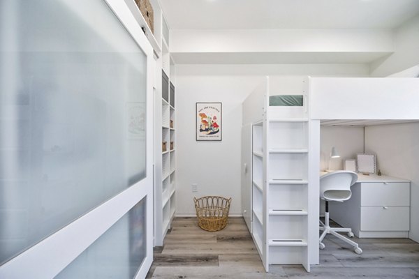 Cozy bedroom with modern decor at 2911 Adams Apartments
